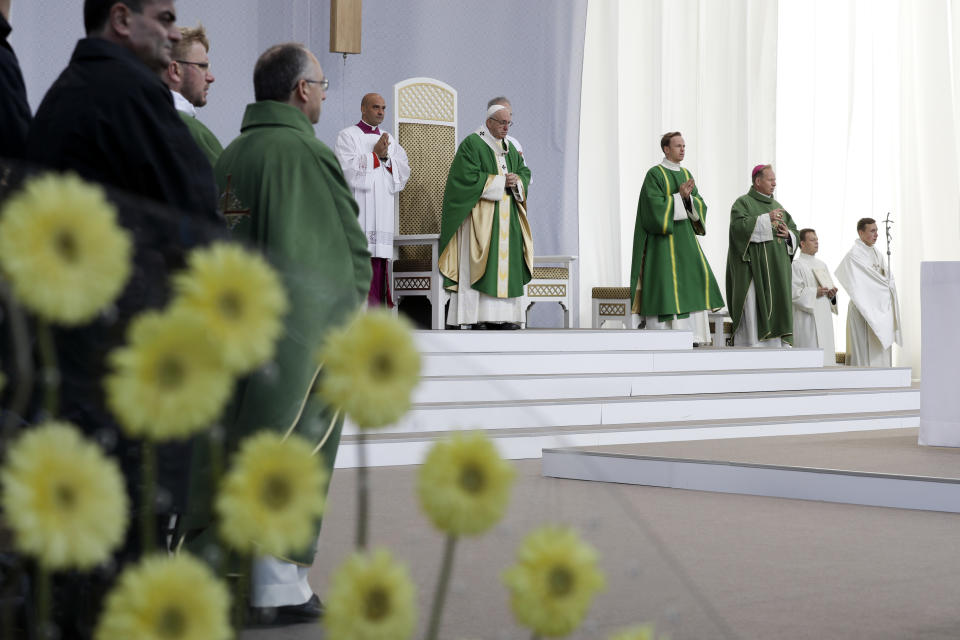 Pope Francis celebrates Mass at the Santakos Park, in Kaunas, Lithuania, Sunday, Sept. 23, 2018. Francis is paying tribute to Lithuanians who suffered and died during Soviet and Nazi occupations on the day the country remembers the near-extermination of its centuries-old Jewish community during the Holocaust. (AP Photo/Andrew Medichini)