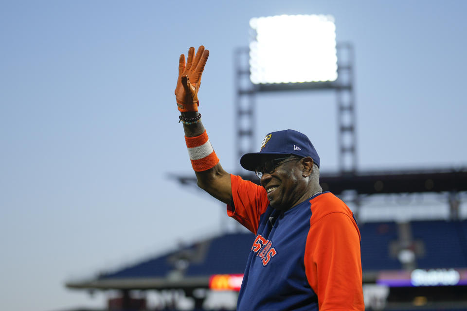 Houston Astros manager Dusty Baker Jr. waves during batting practice before Game 3 of baseball's World Series between the Houston Astros and the Philadelphia Phillies on Tuesday, Nov. 1, 2022, in Philadelphia. (AP Photo/Matt Slocum)