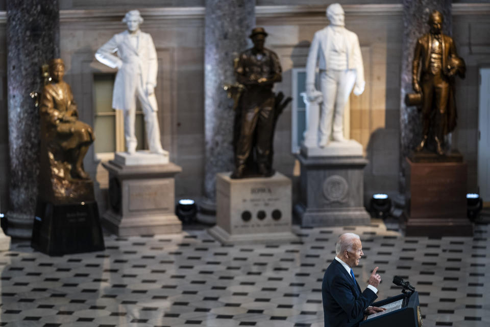 President Joe Biden speaks from Statuary Hall at the U.S. Capitol to mark the one year anniversary of the Jan. 6 riot at the Capitol by supporters loyal to then-President Donald Trump, Thursday, Jan. 6, 2022, in Washington. (Jabin Botsford//The Washington Post via AP, Pool)