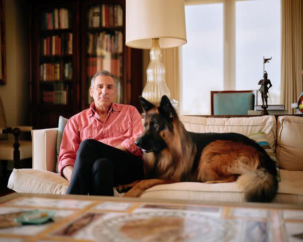 <p>Marcus Ubungen</p> Michael Richards at home with his German Shepard Leo