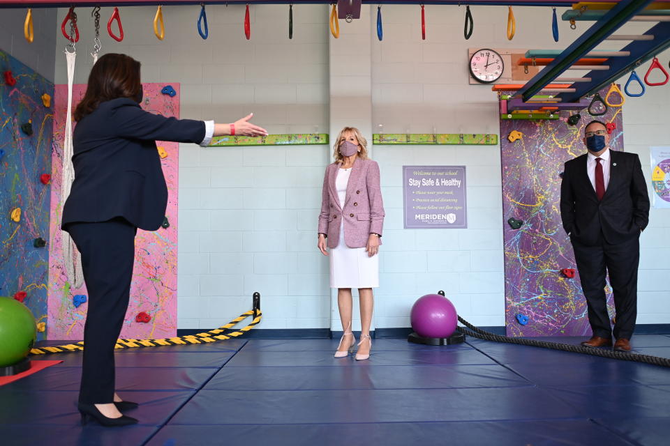 First lady Jill Biden and Education Secretary Miguel Cardona, right, tour Benjamin Franklin Elementary School, Wednesday, March 3, 2021 in Meriden, Ct. (Mandel Ngan/Pool via AP)