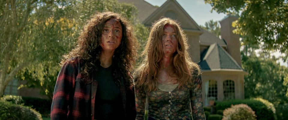 Deena (Kiana Madeira, left) and Sam (Olivia Scott Welch) wrap up their bloody saga in "Fear Street Part 3: 1666."