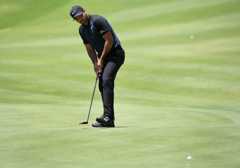 Jason Day of Australia sinks a putt during the second round of the Australian Open, at the Australian Golf Club course in Sydney, on November 24, 2017