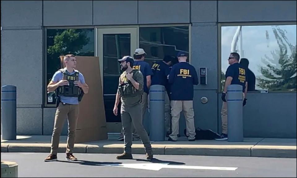 Officials gather outside the FBI building in Cincinnati, after Shiffer attempted to breach the building (FOX19)