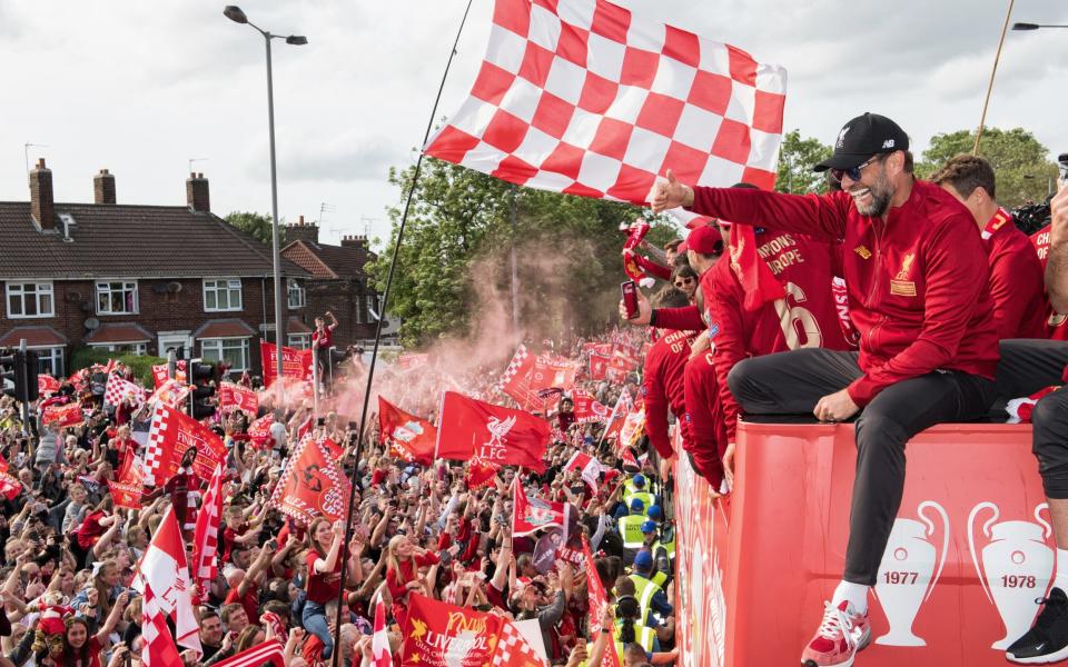 Jurgen Klopp and his Liverpool players on an open top pus parade after winning the 2019 Champions League