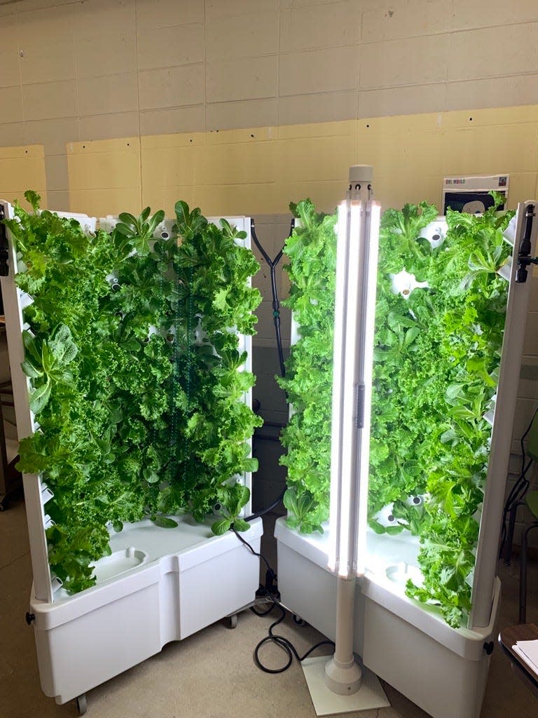 One of the hydroponic garden towers stands open at Bay View Middle School in Howard.
