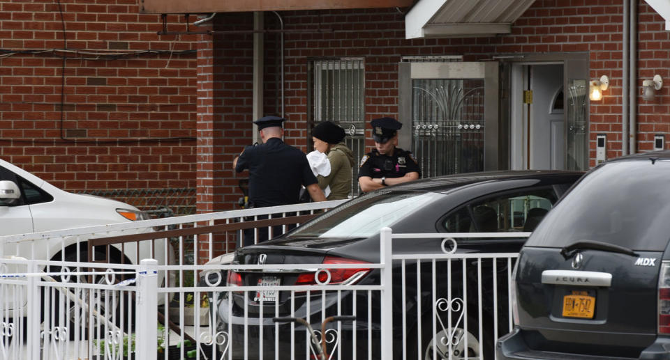 Investigators on the scene at the unlicensed childcare centre in Queens, New York, which was being run as an unlicensed childcare centre. Three babies were stabbed. Source: Getty Images