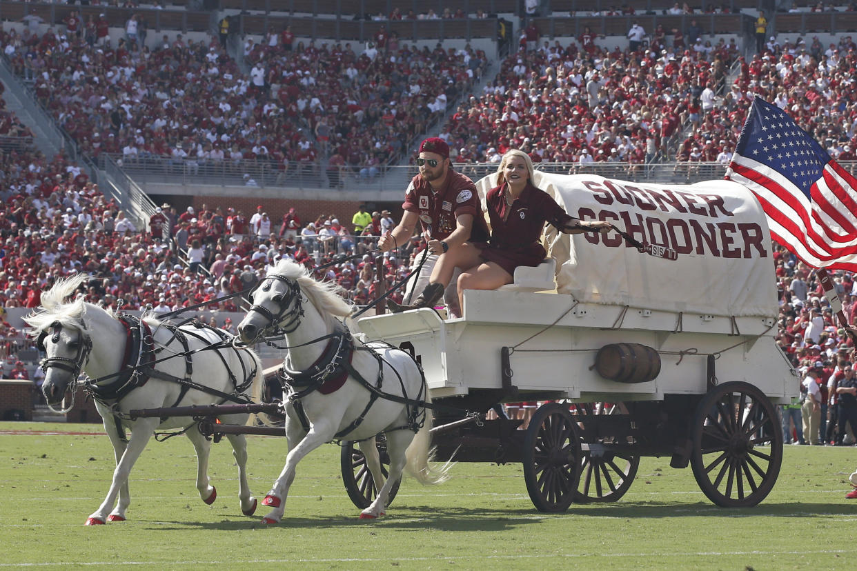 Oklahoma's Sooner Schooner is driven onto the field to celebrate a touchdown in the second quarter of an NCAA college football game against Texas Tech in Norman, Okla., Saturday, Sept. 28, 2019. (AP Photo/Sue Ogrocki)