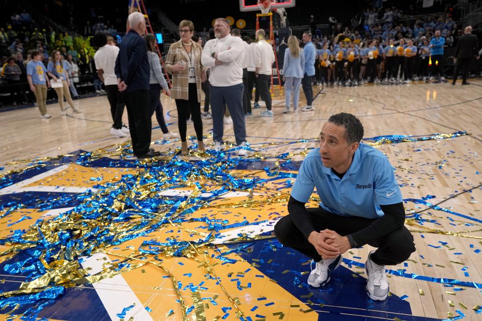 Marquette head coach Shaka Smart takes a moment as his team celebrates after their win over St. John's March 4 at Fiserv Forum in Smart led Marquette to Big East regular season and tournament championships.