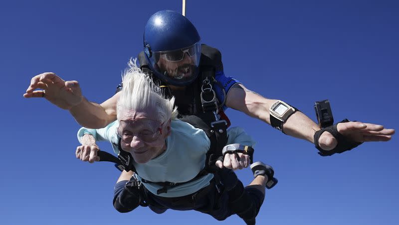 This photo provided by Daniel Wilsey shows Dorothy Hoffner, 104, falling through the air with tandem jumper Derek Baxter as she becomes the oldest person in the world to skydive, Sunday, Oct. 1, 2023, at Skydive Chicago in Ottawa, Ill. 