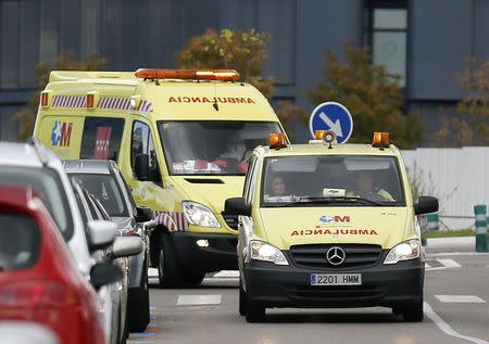 Two ambulances arrive at Madrid's Carlos III Hospital , carrying a possible new Ebola patient, October 16, 2014. REUTERS/Andrea Comas