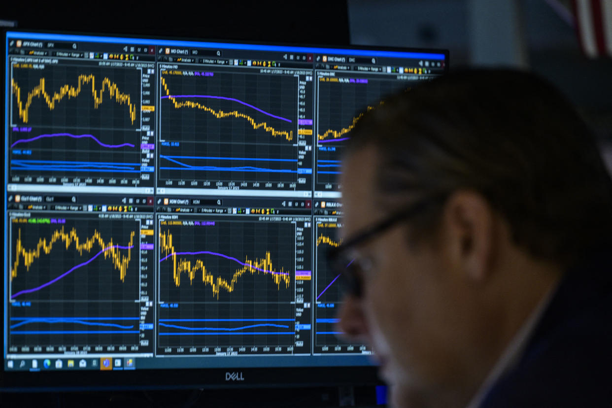 Traders work on the floor of the New York Stock Exchange during opening bell in New York City on January 18, 2023. - Wall Street stocks climbed early on January 18, 2023, on easing worries about further Federal Reserve moves to aggressively counter inflation following the latest US economic data. (Photo by ANGELA WEISS / AFP) (Photo by ANGELA WEISS/AFP via Getty Images)