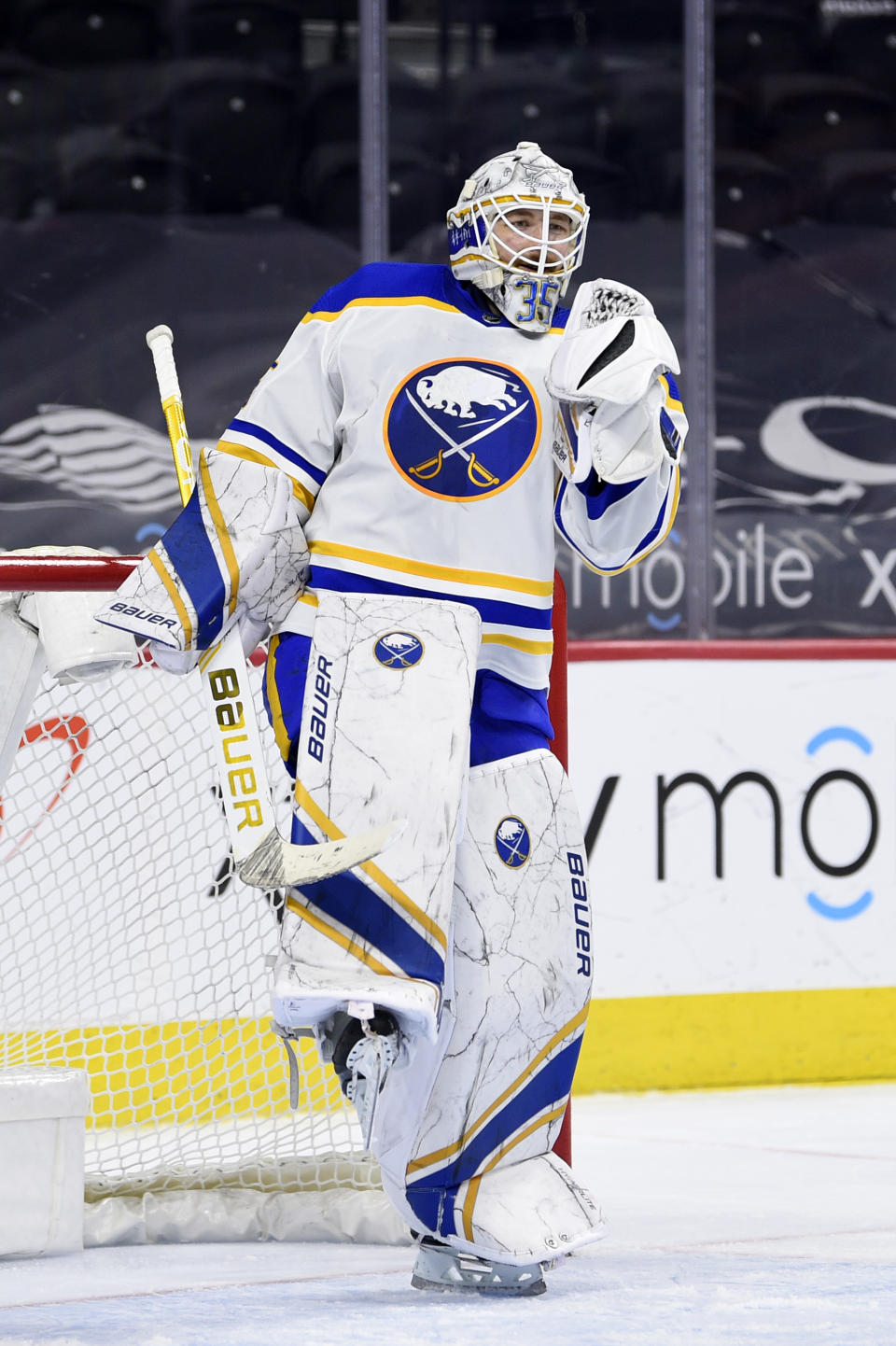 Buffalo Sabres' Linus Ullmark celebrates after the team's victory against the Philadelphia Flyers, Sunday, April 11, 2021, in Philadelphia. . (AP Photo/Derik Hamilton)