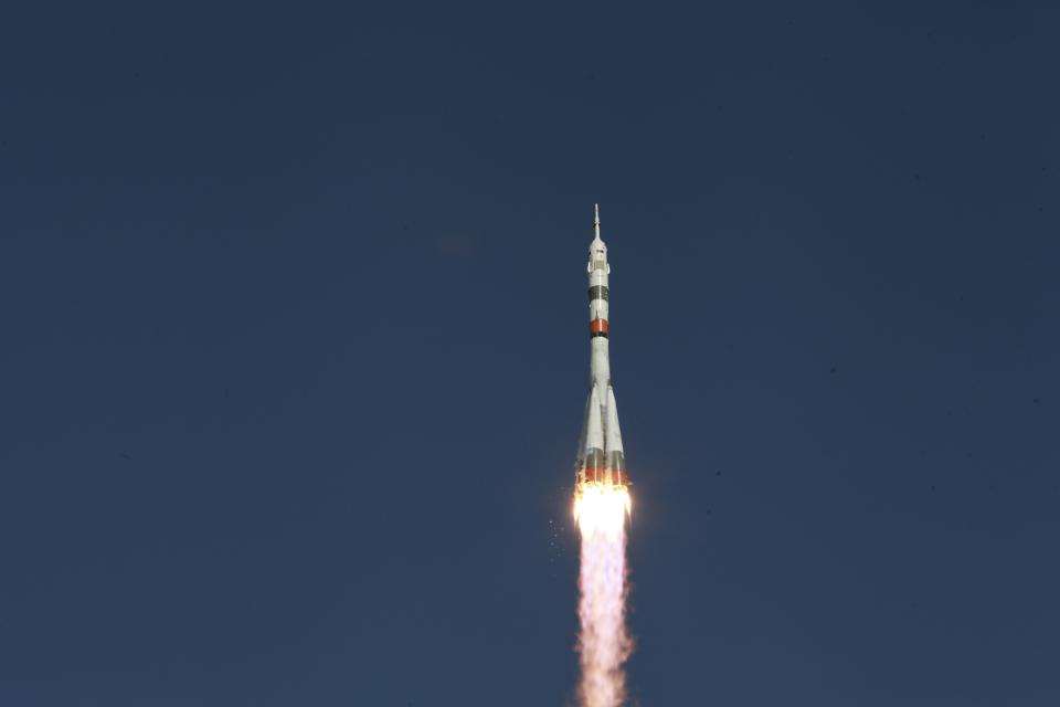 In this photo taken on Thursday, Aug. 22, 2019, and distributed by Roscosmos Space Agency Press Service, the Russian Progress 73 cargo ship blasts off from the launch pad at Russia's space facility in Baikonur, Kazakhstan. The new Russian rocket, that is expected to replace the current model sending manned missions into space, blasted off from Kazakhstan on Thursday, carrying a Soyuz capsule with a humanoid robot. (Roscosmos Space Agency Press Service photo via AP)