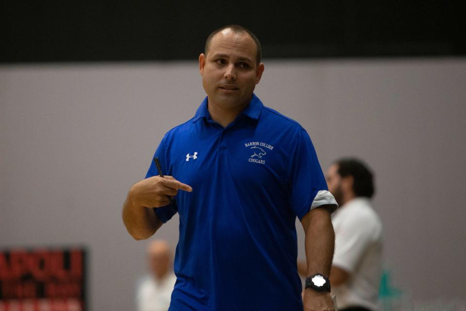 Barron Collier's head coach Yamil Del Valle reacts during the FHSAA volleyball match between Barron Collier and Gulf Coast, Tuesday, Aug. 30, 2022, at Gulf Coast High School in Naples, Fla.Gulf Coast defeated Barron Collier in 3-0 sets.