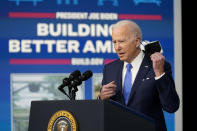 President Joe Biden begins to speak about the Bipartisan Infrastructure Law at the South Court Auditorium in the Eisenhower Executive Office Building on the White House Campus in Washington, Friday, Jan. 14, 2022. (AP Photo/Andrew Harnik)