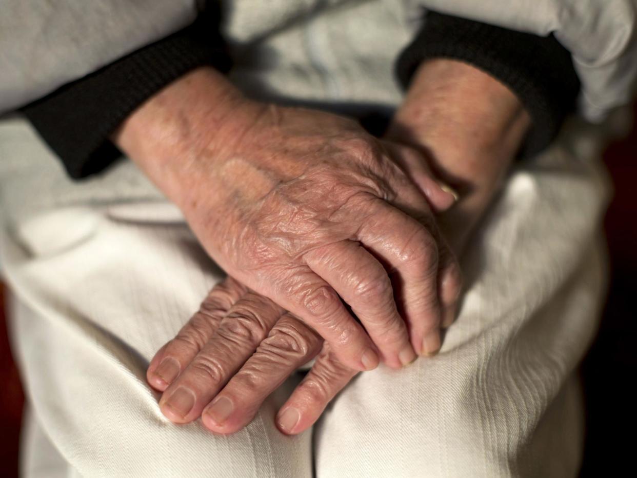 An undated photo showing the hands of an elderly woman: Yui Mok/PA Wire/PA Images