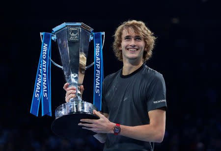 Tennis - ATP Finals - The O2, London, Britain - November 18, 2018 Germany's Alexander Zverev celebrates with the trophy after winning the final against Serbia's Novak Djokovic Action Images via Reuters/Andrew Couldridge