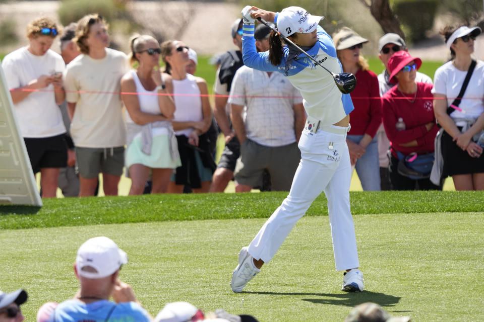 Jin Young Ko, of South Korea, hits from the first tee during the first round of the Drive On Championship golf tournament, Thursday, March 23, 2023, in Gold Canyon, Ariz. (AP Photo/Matt York)