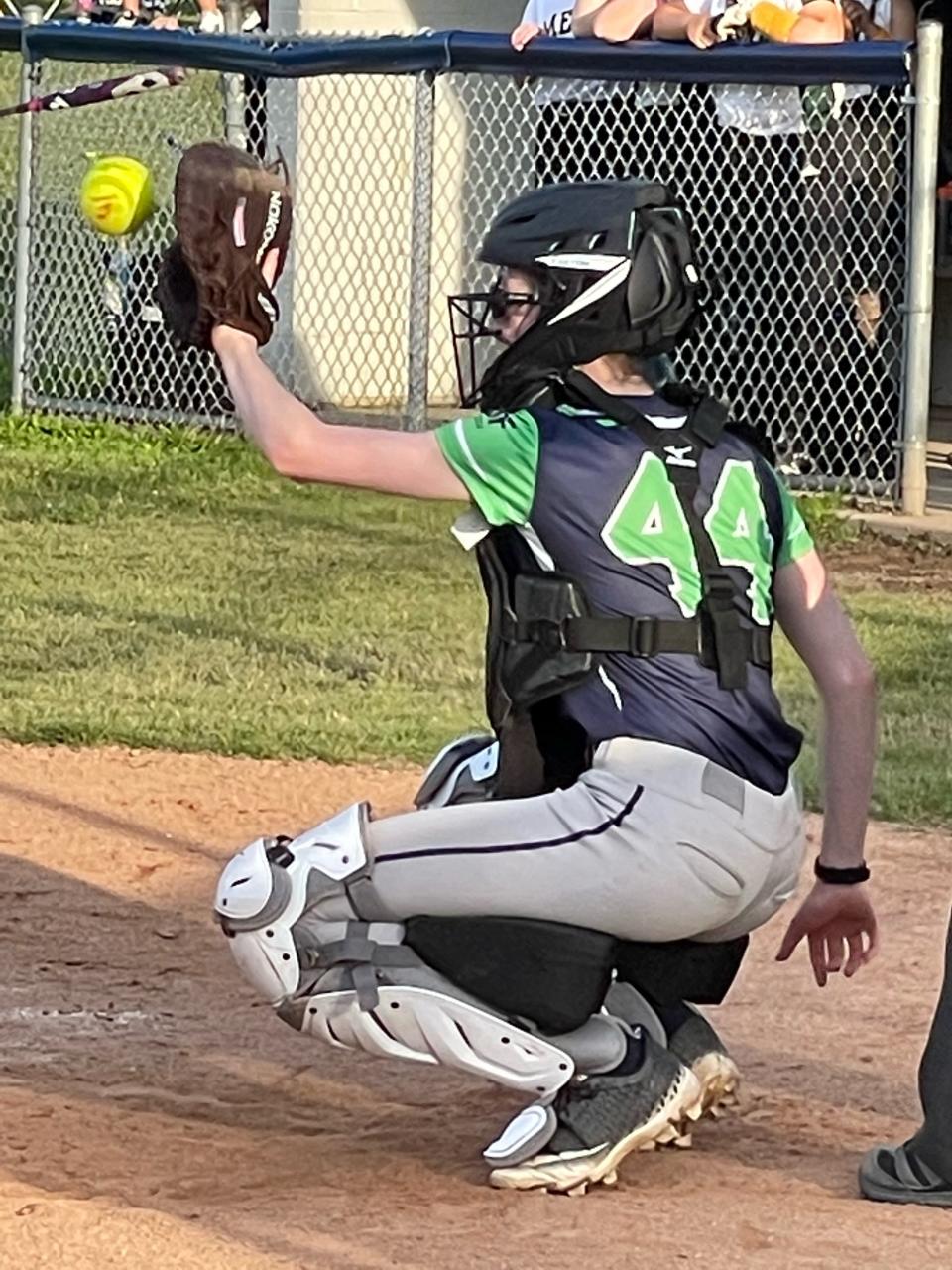 Ember Zelch, 17, a transgender girl, catches a ball for her high school softball time. She is one of only three transgender girls approved by the Ohio High School Athletic Association to play sports at the high school level out of about 400,000 student-athletes.