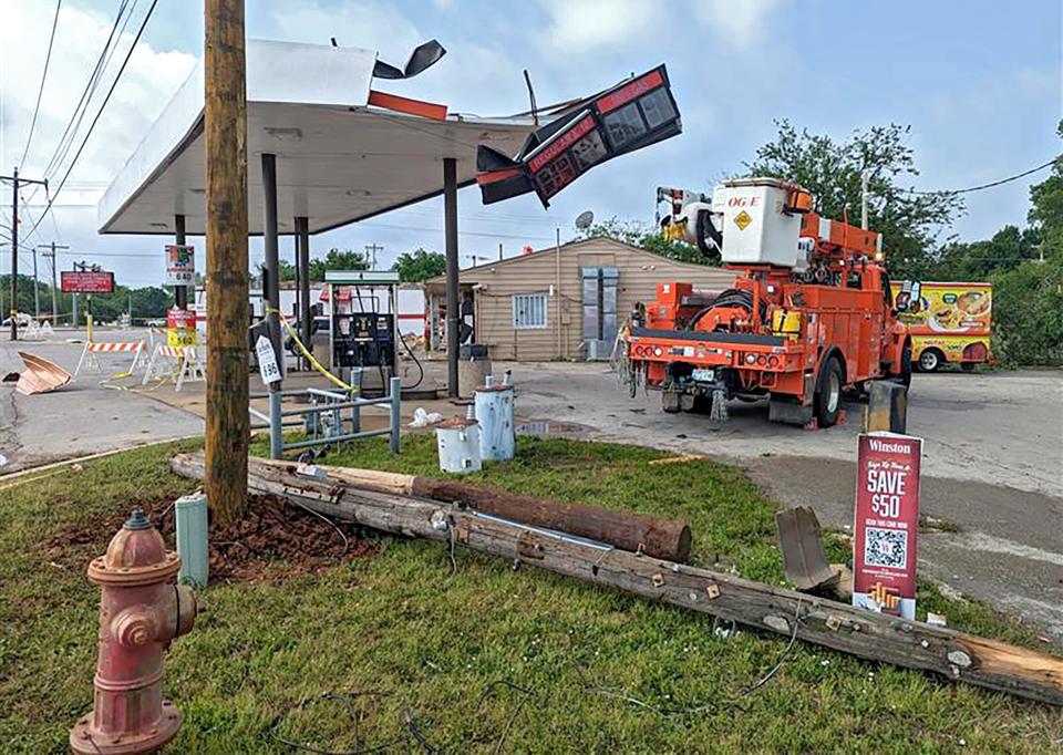 Damage to the Loyd Superette convenience store in Noble is seen Friday after tornadoes hit the area on Thursday evening. The gas station took visible damage to the canopy and the signage surrounding the pumps, along with extensive damage to one end of the building.