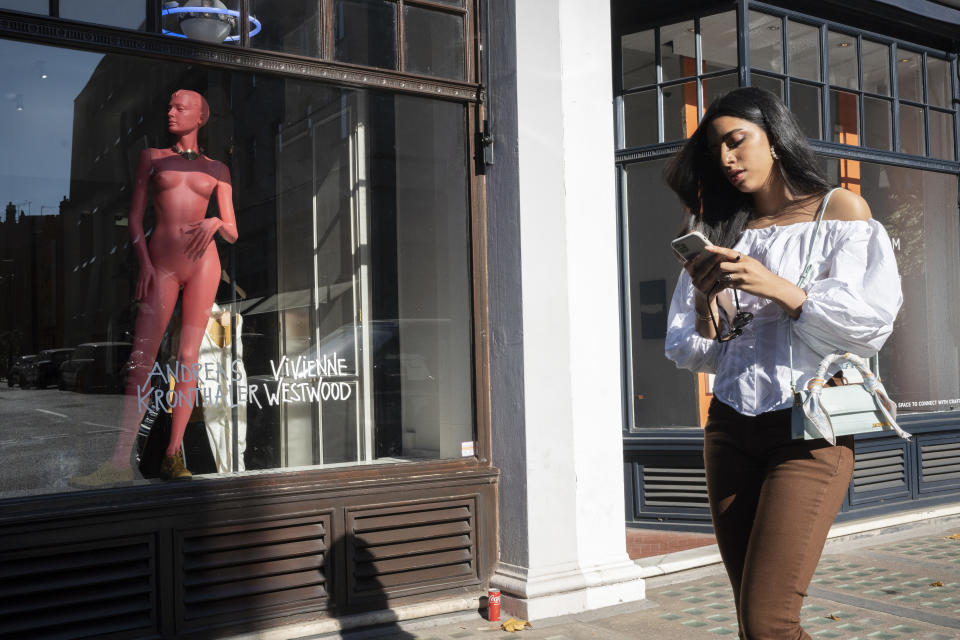 prices  A woman walks past the Andreas Kronthaler and Vivienne Westwood retailer in Mayfair, on 12th August 2022, in London, England.