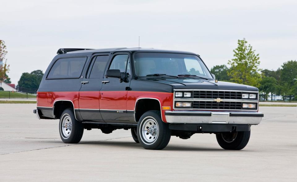 <p>The Suburban is the granddaddy of all SUVs-and the longest continuously running nameplate in the U.S.. The very first workhorse Suburbans were produced in 1936, and they continue to provide unmatched hauling capability today. The square-body trucks from the 1970s through the early 1990s are the ones that established the Suburban as a mainstream family vehicle. After all, these were the first Suburbans to gain four real doors. Hunt down a Suburban with a bench seat in all three rows and you could carry nine people. These square Suburbans were sold in large numbers over their 19-year production run; most of them have a strong and reliable 350-cubic inch V-8 under the hood. Four-wheel-drive was a popular option and many early trucks used a three-speed automatic backed by a stout NP 205 transfer case. It’s a drivetrain that could put up with plenty of abuse. But like its platform-mate the Blazer, there were plenty of Suburbans that came with the relatively unloved full-time 4WD system.<br><br></p><p>Strongest of the breed are the three-quarter-ton 20-series trucks (later known as 2500-series), using beefier transmissions, axles and a stiffer suspension to handle heavy trailers. Two-wheel-drive Suburbans were sold in large numbers for their towing capability. The venerable big-block 454-cubic-inch engine was only available in 2500-series Suburbans with rear-wheel-drive; these beasts could tow 10,000 pounds. Suburbans gained refinement in the late 1980s with the addition of four-speed overdrive automatics and electronic fuel injection arriving in 1987 and ABS landing on 1988 trucks. Suburban was also the name used on the parallel GMC model (today it’s called the Yukon XL), so don’t forget to include that brand if you’re searching for one; the differences between and Chevy and GMC versions is negligible.<br><br></p><p>Owning a vintage Suburban brings so much versatility, it’s surprising that these trucks aren’t more valuable. After all, here is a classic truck that can handle people like a minivan, tow like a big pickup and explore the back country with ease. The earlier ones look particularly cool today with their dog-dish hubcaps and optional woodgrain side paneling. But most Suburbans (of every year) were used like beasts of burden, and few survive in nice condition. Later ones from the 1980s are more plentiful and retain most of the old-school style of the early ones. And every Suburban benefits from sharing a platform with the C/K pickups and the Blazer because parts are-everywhere. Specialists have developed proven upgrade parts for the pickups and Blazers; It’s possible to build an incredibly capable Suburban. Hagerty says a mid-1970s Suburban K20 has an average value of just under $10,000, with fully restored models bringing just under $30,000. The average value for a late 1980s Suburban 2500 with 4WD is $8,300, with top trucks bringing just over $20,000.</p>