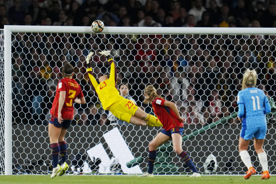 A shot from England's Lauren Hemp, right, hits the crossbar during the Women's World Cup soccer final between Spain and England at Stadium Australia in Sydney, Australia, Sunday, Aug. 20, 2023. (AP Photo/Abbie Parr)