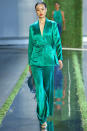 <p>There’s no question that the Duchess of Sussex loves a great suit. She’s worn versions from Altuzarra and Givenchy already, but this bright emerald number from Cushnie’s Spring 2019 show would be a perfect match for Meghan. (Photo: Getty Images) </p>