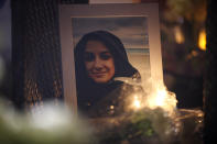 <p>A photograph of Anne Marie D’Amico, a victim of the mass killing, is shown at a vigil on April 24, 2018 in Toronto, Canada. (Photo: Cole Burston/Getty Images) </p>