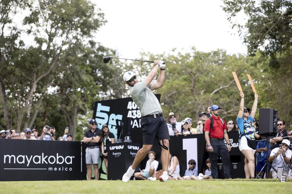 Dean Burmester, of Stinger GC, hits from the first tee during the final round of LIV Golf Mayakoba at El Camaleón Golf Course, Sunday, Feb. 4, 2024, in Playa del Carmen, Mexico. (Chris Trotman/LIV Golf via AP)