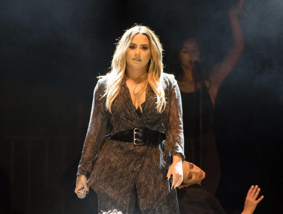 Demi Lovato — pictured performing on July 22, two days before she was rushed to the hospital — was photographed over the weekend looking happy and healthy. (Photo: C Flanigan/Getty Images)