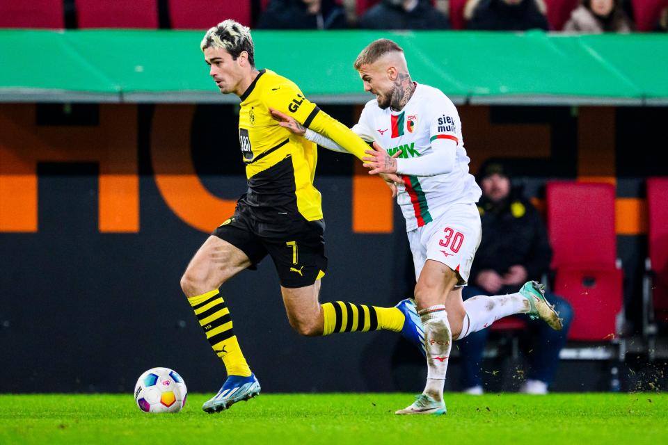 Gio Reyna, left, in action for Borussia Dortmund (AP)