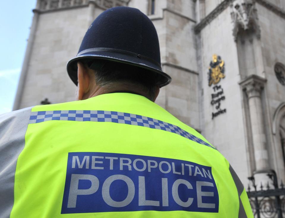 File photo dated 02/03/17 of a Metropolitan Police Service (MPS) officer outside the Royal Courts of Justice in central London. Victims are being failed by the criminal justice system because of widespread problems with hiring and keeping experienced staff and officers, a group of watchdogs has warned. Inspectors who scrutinise the work of prosecutors, police forces, prisons and probation services have called for answers on why people are leaving their roles. Issue date: Thursday February 15, 2024.