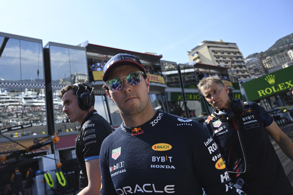 Red Bull driver Sergio Perez of Mexico walks on the side of the track after crashing out of the Formula One qualifying session, at the Monaco racetrack, in Monaco, Saturday, May 27, 2023. The Monaco Formula One race will be held on Sunday. (Photo Christian Bruna, Pool Photo Via AP)