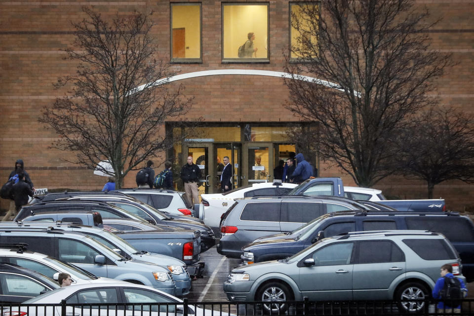 Students arrive at Covington Catholic High School as classes resume following a closing due to security concerns the previous day, Wednesday, Jan. 23, 2019, in Park Hills, Ky. A group of boys from the school went to Washington for an anti-abortion rally last Friday and their encounters with a Native American activist and a black religious sect were captured on video and spread on social media, drawing widespread criticism. (AP Photo/John Minchillo)