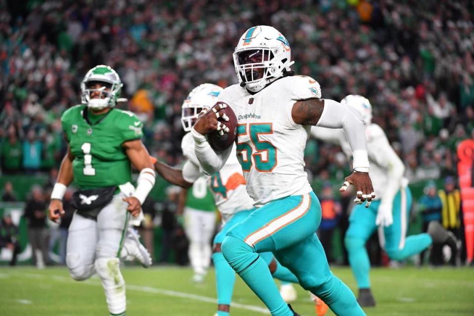 Former Miami Dolphins linebacker Jerome Baker (55) returns an interception for a touchdown during the third quarter against the Philadelphia Eagles at Lincoln Financial Field in Philadelphia Oct. 22, 2023. The Seahawks signed Baker to a one-year contract on March 19, 2024.