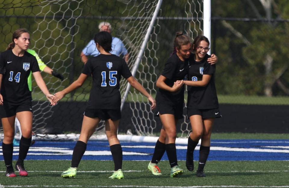 Zanesville's Rylee McCuen and Kaidence Burkett celebrate McCuen's goal against Maysville.