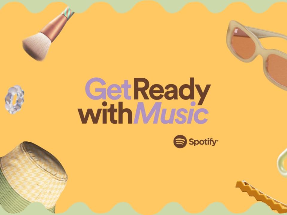 The words “Get Ready With Music” and the Spotify logo against a yellow background, surrounded by floating makeup tools and accessories.