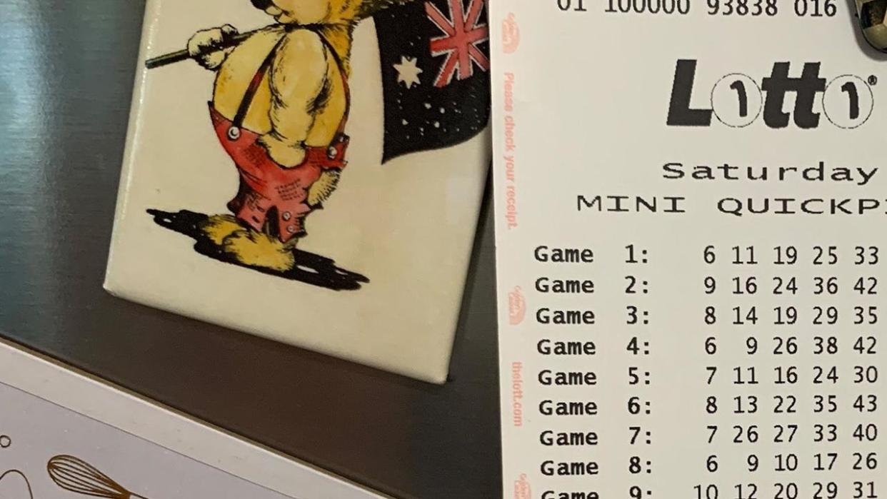 A Sydney mum says her children will be able to “grow up safe and happy” after she discovered a $2 million dollar lotto ticket stuck to her fridge. Picture: Supplied