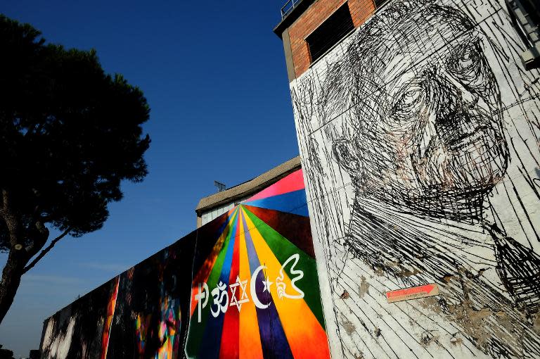 A painting on a wall of the Metropoliz Museum of the Other and the Elsewhere (MAAM) which is also home to 200 squatters, including Roma and people from all corners of the globe, in Rome, on November 25, 2014