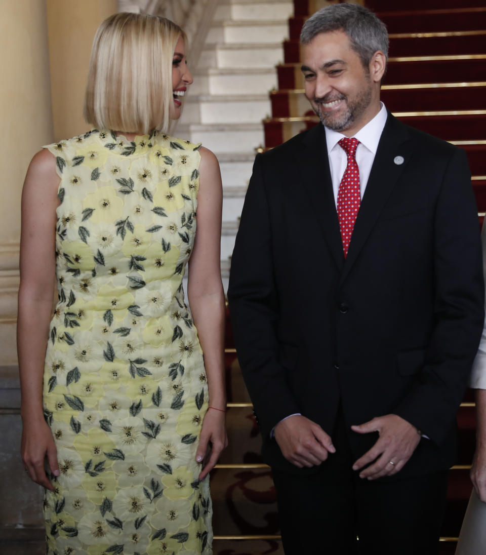 Ivanka Trump, President Donald Trump's daughter and White House adviser, and Paraguay's President Mario Abdo Benitez, smile as they pose for photos at Presidential Palace in Asuncion, Paraguay, Friday, Sept. 6, 2019. Ivanka Trump is on her third stop of a South American trip to promote women's empowerment. (AP Photo/Jorge Saenz)