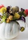 <p>Turn your pumpkin it into a pretty vase that makes a stunning autumn centerpiece.<br><br>Get the tutorial at <a href="https://sugarandcloth.com/diy-halloween-floral-centerpiece/" rel="nofollow noopener" target="_blank" data-ylk="slk:Sugar & Cloth;elm:context_link;itc:0;sec:content-canvas" class="link ">Sugar & Cloth</a>.</p>