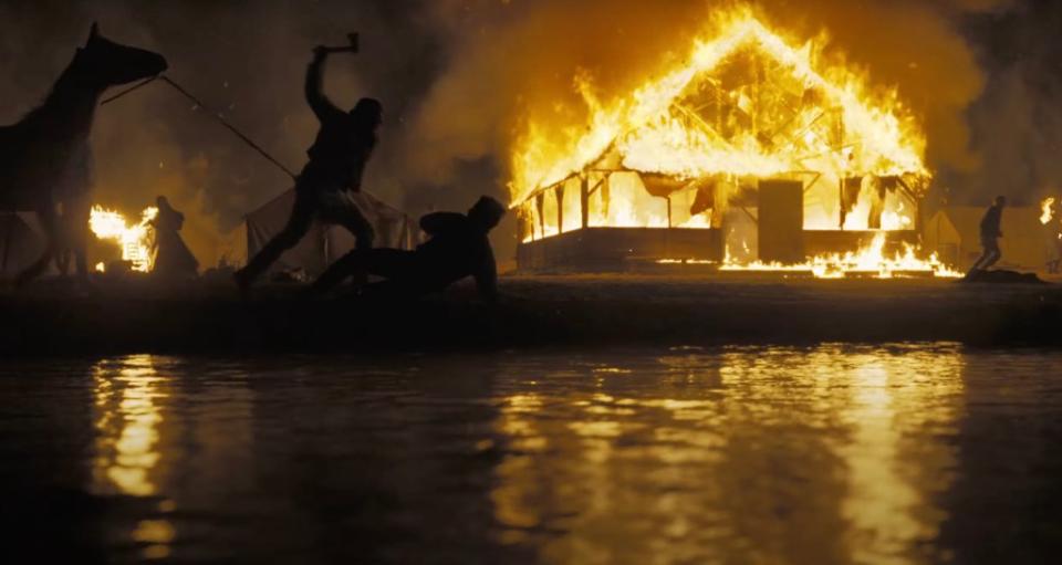 Homes burning in the “Horizon” trailer. YouTube/Warner Bros. Pictures