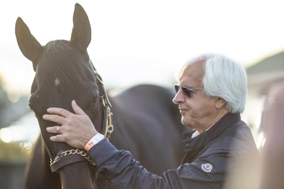 Trainer Bob Baffert stands with Medina Spirit outside his barn on the backside of Churchill Downs on May 2, 2021, the day after the colt crossed the finish line first in the 2021 Kentucky Derby. Medina Spirit tested positive for a substance banned on race day and was later disqualified from that Derby win. The horse died in December 2021. Ryan C. Hermens/rhermens@herald-leader.com