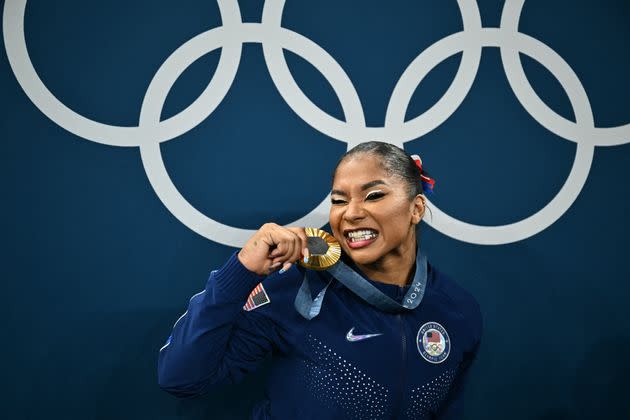 Chiles poses with the gold medal after the podium ceremony for the women's artistic gymnastics team final during the Olympics at the Bercy Arena in Paris, on July 30.