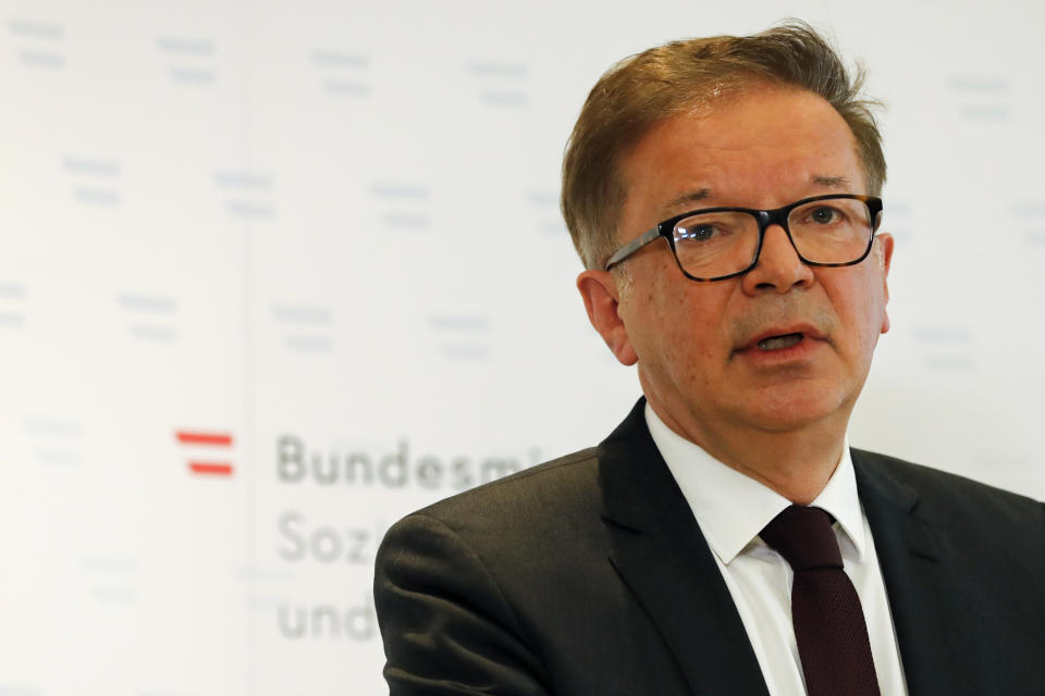 Austrian health minister Rudolf Anschober announces his resignation due to health problems and overworking in Vienna, Austria, Tuesday, April 13, 2021. Anschober said that he couldn’t continue in the grueling job of helping lead the country’s coronavirus response because of persistent personal health problems. (AP Photo/Lisa Leutner)