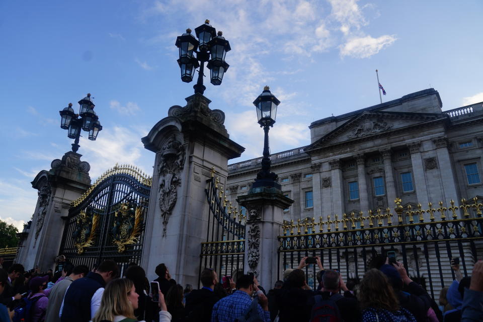 <p>The Union Flag above Buckingham Palace in central London is flown at half mast following the announcement of the death of Queen Elizabeth II. Picture date: Thursday September 8, 2022. (Photo by Victoria Jones/PA Images via Getty Images)</p> 