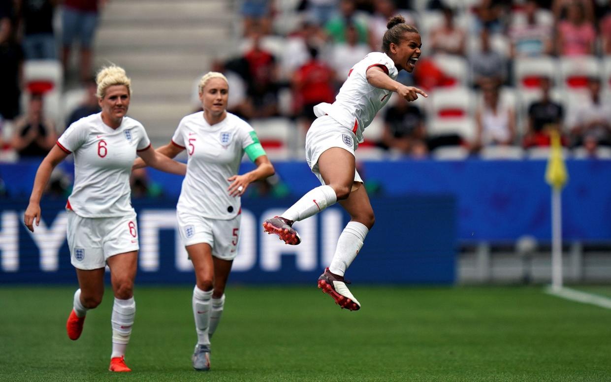 Nikita Parris celebrates scoring England's first goal against Scotland - PA