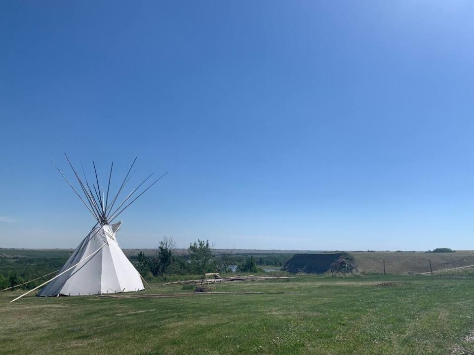 A teepee overlooks the Bow River. Indigenous tourism operators say they are feeling hopeful as pandemic restrictions start to ease. (Terri Trembath/CBC - image credit)